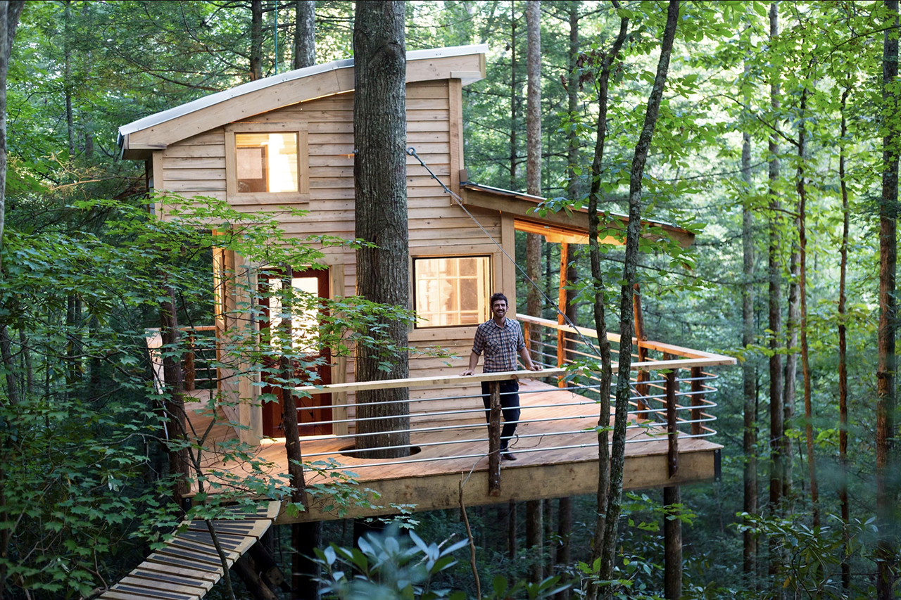 The Sylvan Float
Campton, Ky.
Price Starts at $380 | Hosts 2 Guests
”The Sylvan Float tree house is a treehouse in its purest form. Floating above the forest floor this arboreal abode is suspended between a red oak and hickory. With a full wrap around porch and cozy lofted room, the tree house is designed for two. Great views, fully enclosed room with heat, and a gas stove allow you to relax and feel at home after a day of exploring the gorge. Located five minutes from the martins fork trail head, spectacular hiking and climbing is not far after you leave the canopy and step onto the forest floor. Waking up in the tree tops has a magical effect you have to experience for yourself!” — rrgcabin.com