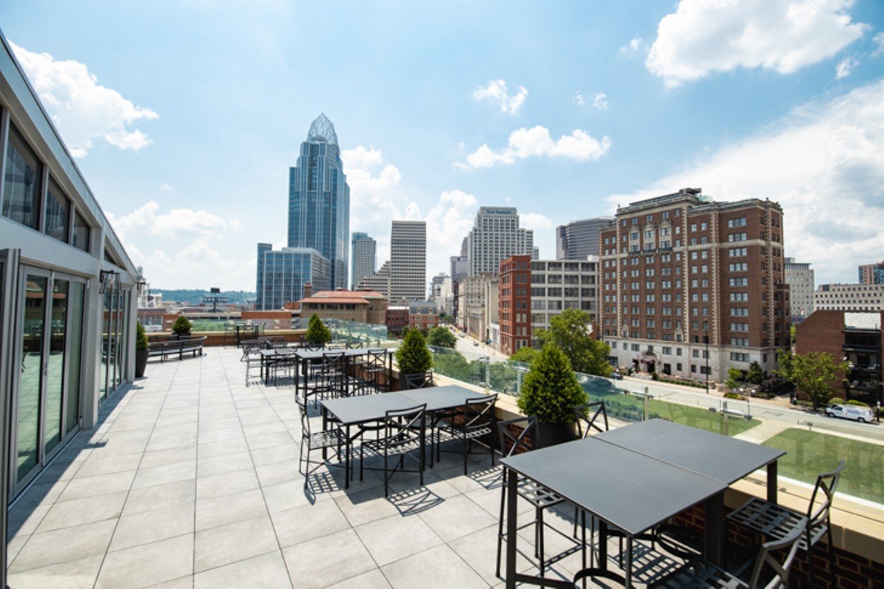 Vista at Lytle Park Hotel
311 Pike St., Downtown
Cincinnati&#146;s new Lytle Park Hotel features a spectacular rooftop patio named the Vista at Lytle Park. The over 5,000-square-foot rooftop lounge offers panoramic views of the Queen City and Ohio River. The space is equipped with an "indoor" lounge (where the bar is located) lined with windows that open up to the outdoor patio with two fireplaces, lounge seating and tables. Vista's menu differs from Subito's, offering a more shareable approach. Choose from a selection of cocktails, wine, beer and spirits, or opt for their large-format cocktails that serve four or more, like the Magnolia Muse with Karrikin's Shuga rum, magnolia blossom tea, pineapple, mango and passionfruit puree. Their food offerings range from a charcuterie board to "naanchos" or peel-and-eat grilled shrimp.
Photo: Hailey Bollinger