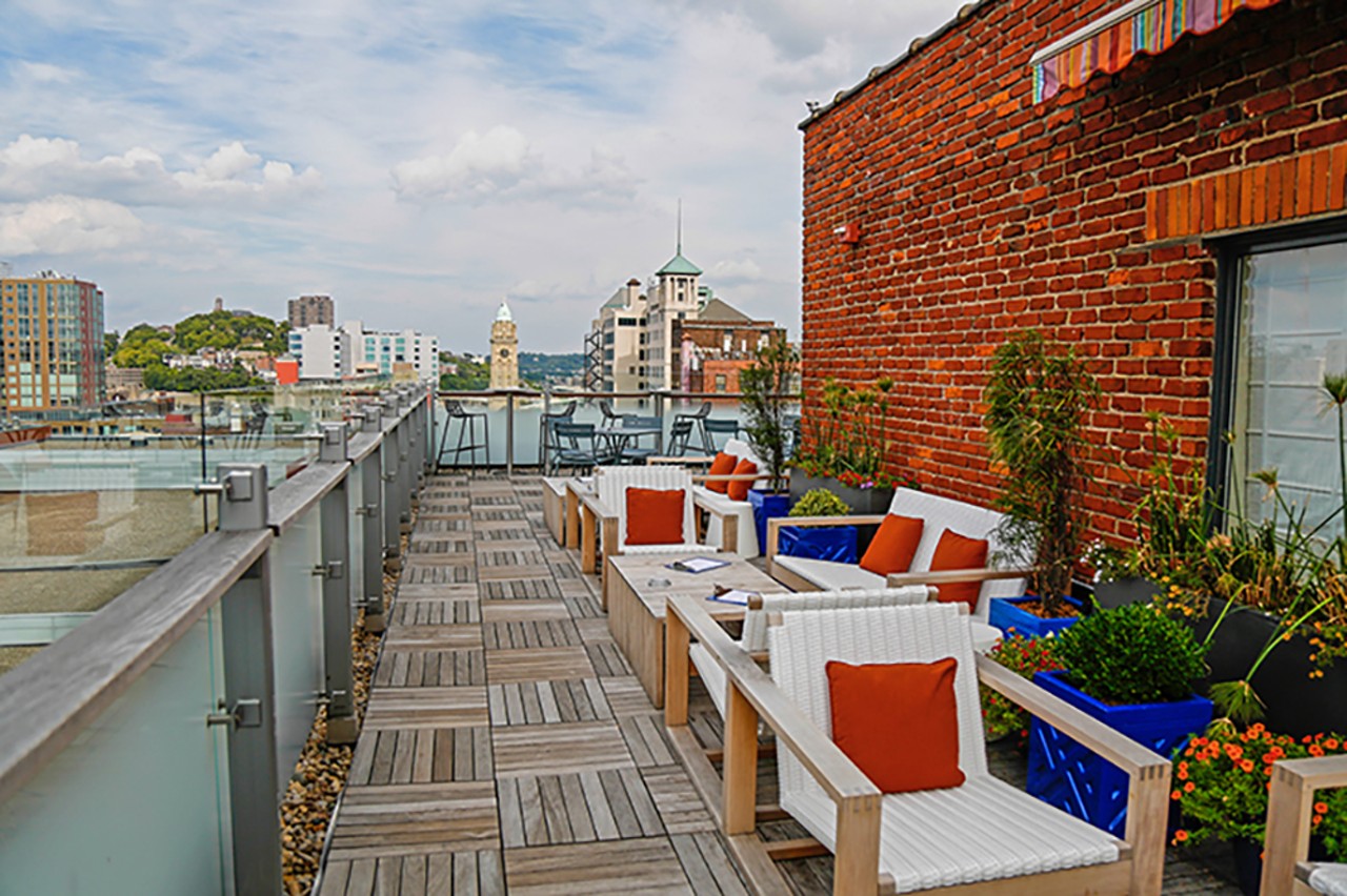 21c Museum Hotel's Cocktail Terrace
609 Walnut St., Downtown
Slink your way down Gano Alley and take a secret, escorted elevator ride up 11 floors to the seasonal 21c Museum Hotel rooftop terrace and watch the sunset over downtown with a 'pop-tail' in hand. The uniquely flavored popsicles are made from scratch and then added to chilled spirits to be sipped, stirred or licked. The terrace also offers adult slushies, masterful mixology, a streamlined snack menu and more from its aerial 75-seater vantage point.
Photo: Hailey Bollinger