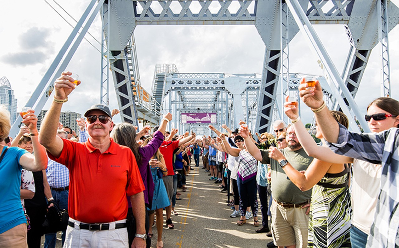 FRIDAY 14
EVENT: Second Annual Big Bourbon Toast
Newport distillery New Riff is celebrating National Bourbon Day on June 14 with its second annual big ass bourbon toast on the Purple People Bridge. The distillery is inviting anyone and everyone who likes bourbon to head to the bridge to reenact last year&#146;s World&#146;s Biggest Bourbon Toast, which it held to honor the release of its first long-awaited batches of New Riff brand bourbon. This year, the first 500 guests will get a commemorative Big Bourbon Toast shot glass filled with New Riff bourbon to toast. If you aren&#146;t one of the first 500 &#151; or if you just want more than a shot of booze &#151; there will be cash bars set up along bridge for additional cocktails. In addition to the toast, this year will also feature a tug of war between Kentucky and Ohio. For ages 21 and up. 5:30-8:30 p.m. Friday. Free admission. Purple People Bridge, 1 Levee Way, Newport, newriffdistilling.com.
Photo: Hailey Bollinger