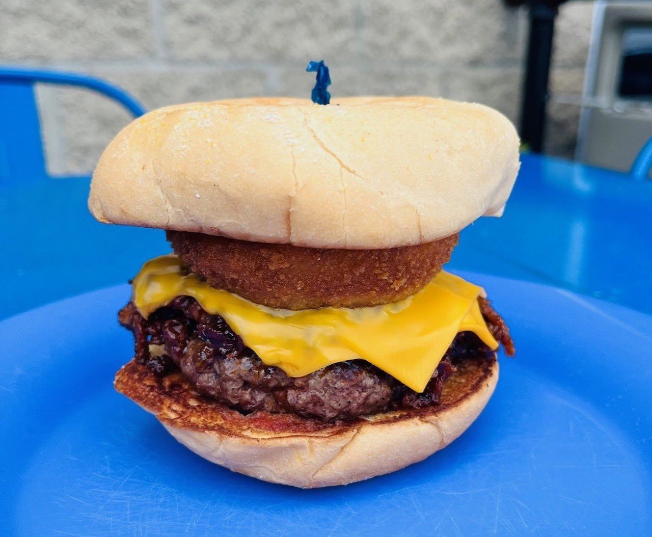 Bucketheads: The Godfather Burger
6507 Harrison Ave., Green Township
Who it’s named after: Dontay Corleone, defensive tackle for the Cincinnati Bearcats
The burger: Topped with BBQ beef brisket, American cheese and an onion ring.