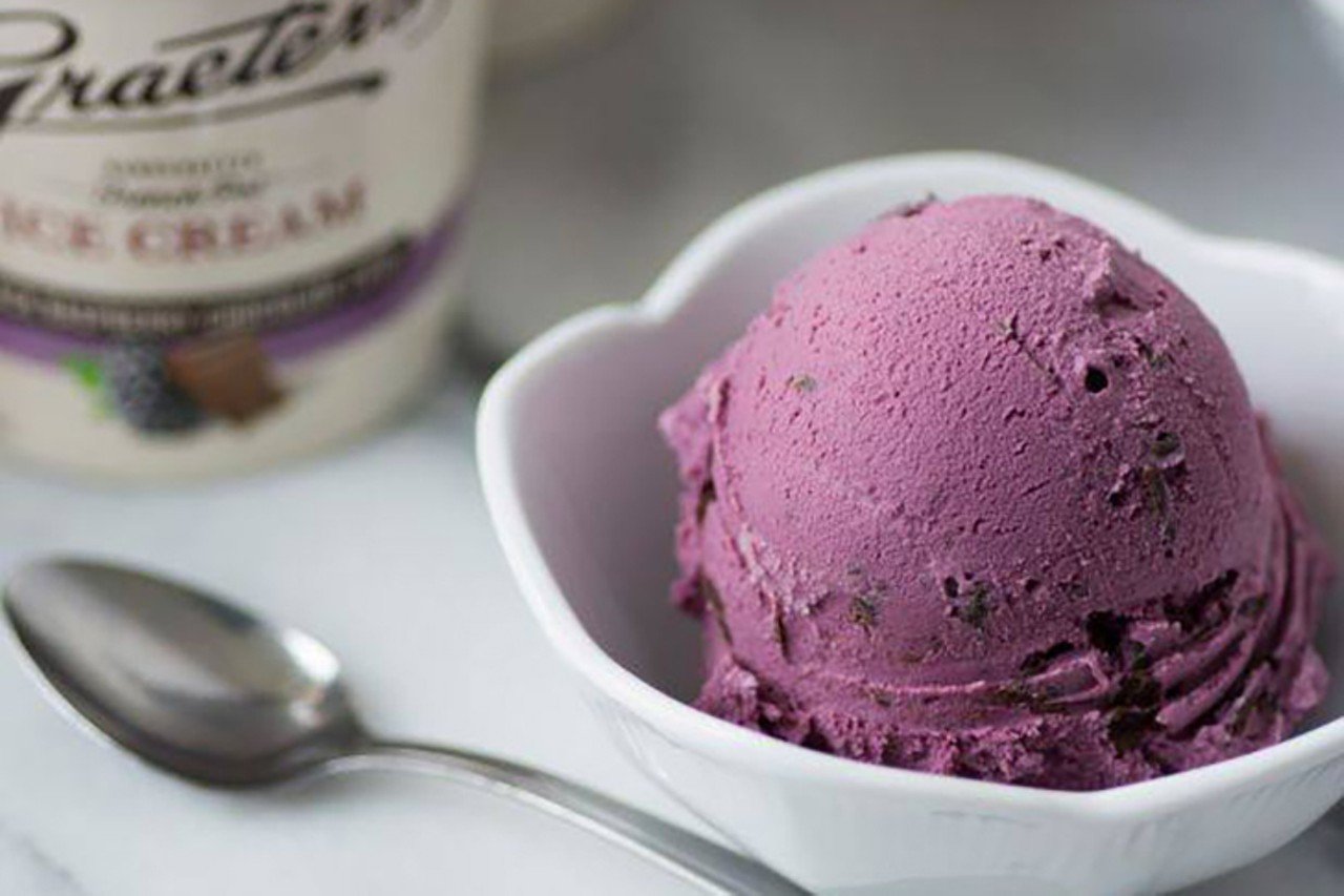 Graeter&#146;s Black Raspberry Chocolate Chip Ice Cream
Multiple locations including 643 Vine St., Downtown; 290 Ludlow Ave., Clifton; 617 W. Third St., Covington
Since its founding in 1870, Graeter&#146;s French Pot Ice Cream, handmade chocolate confections and fresh-baked goods have become Queen City traditions. Today, the Graeter family still faithfully uses century-old recipes and methods of production, including making each 2-and-a-half gallon batch in a French pot freezer and packing each pint by hand. Black Raspberry Chocolate Chip is their signature flavor &#151; and an Oprah Winfrey favorite. The flavor is crafted with black raspberries from Oregon's Willamette Valley and bittersweet chocolate chunks. Instead of boring old chips, Graeter's pours liquid chocolate into each batch resulting in wonky-sized and sometimes gigantic pieces of chocolate; whoever gets the biggest chunk wins.
Photo via Facebook.com/Graeters