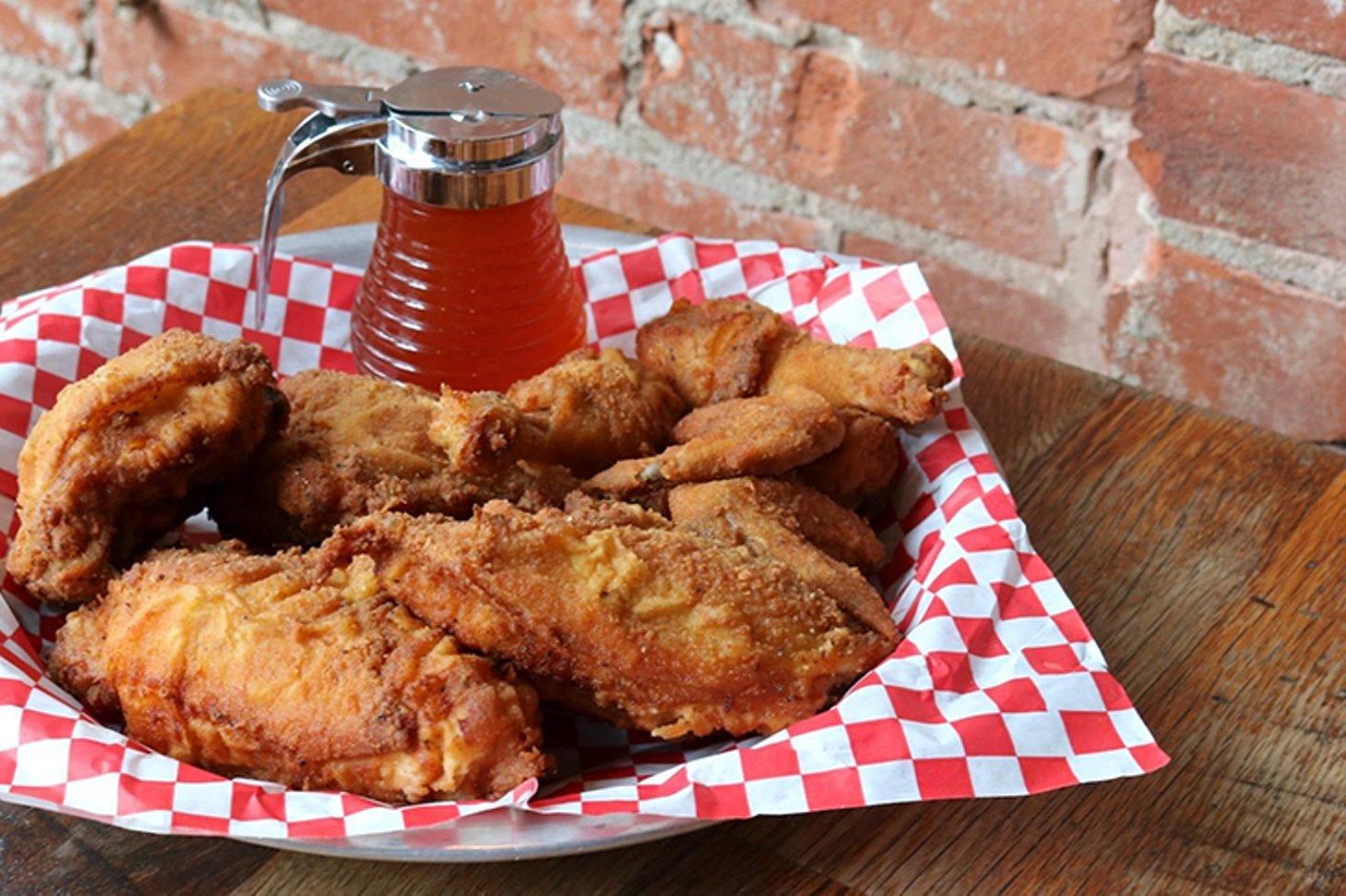 The Eagle's Fried Chicken
1342 Vine St., Over-the-Rhine
The Eagle is nested inside a retired post office and has a relatively small menu, comprised of fried chicken, sandwiches, snacks and several side dishes. The crowd-favorite fried chicken is free-range, all natural and sourced from Ohio farms. Opt for a whole, half chicken (white and dark meat) or a quarter of a chicken (select white or dark). The Southern greens and artichoke dip is a must. Booze-wise, they serve 100 kinds of beer and have about 15 different brews on tap. 
Photo via Facebook.com/TheEagleOTR