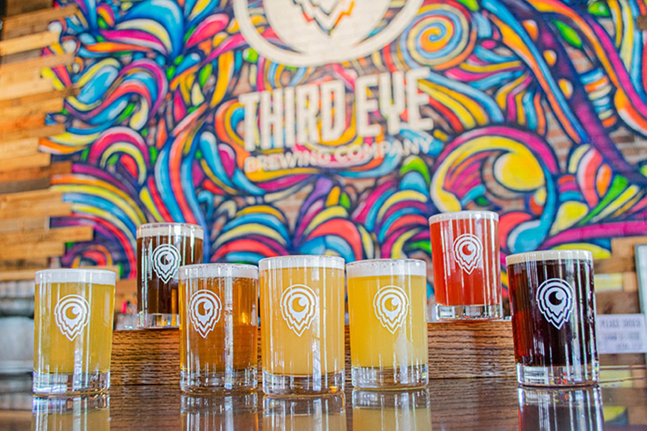 Third Eye Brewing
11276 Chester Road, Sharonville
Third Eye is one of the newest breweries to hit the Cincinnati beer scene; it hosted its grand opening June 17. Walk in to the brewery and you are faced with a vibrant and whimsical atmosphere, with a colorful and slightly psychedelic mural by David Jonathan Uy serving as the centerpiece of the bar and giving the industrial space some &#147;warmth and character,&#148; says co-owner Tom Collins.
The creative design of the space goes hand in hand with their unique and playful brews, including Jelly Brain, a milkshake IPA with pineapple and coconut, and Beyond Sight, a brown ale with hazelnut. More traditional brews are up for grabs, too, like the West Coast IPA called Third Eye P.A. and a chocolate oatmeal stout named Astral. 
Chef Steven Vanderpool has designed a menu to match the creativity of the rest of the experience with &#147;a bit of Southern and Cajun flare to spice things up,&#148; says Collins, including a low country shrimp boil and Cajun garlic herb wings.
Photo: Savana Willhoite