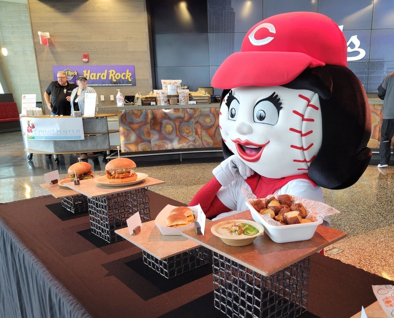 Catch a Reds Game and Chow Down on a Vegetarian Hotdog
100 Joe Nuxhall Way, The Banks
Great American Ball Park debuted a slate of new snacks for the 2022 season — even some elevated fare made especially for vegetarians. The new menu includes two veg-friendly hot dogs: the Lookout Dog and the Dragon Dog. The Lookout is a plant-based frank smothered in white bean buffalo dip, shredded cheddar cheese, pickled jalapeños and hot sauce, while the Dragon Dog is topped with kimchi, garlic soy sauce and sesame aioli. Vegetarians can also enjoy the cauliflower “wings,” which are hunks of fried, parmesan-encrusted cauliflower in a sweet hot sauce with celery and blue cheese dip on the side. There are also pretzel bites — toasty portions of dough accompanied by queso, pico de gallo and jalapeños. Some items are available only at specific locations within the ballpark.