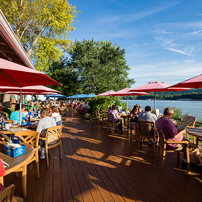 Cabana on the River7445 Forbes Road, Sayler ParkThis Margaritaville-esque oasis on the river will make you feel like you’re on vacation with their neon palm trees out front, sand volleyball courts, multiple walk-up bars where you can snag a drink while you wait for a table and just overall Jimmy Buffett vibes. While all the seating is technically outside, the best seats aren’t underneath the awning, but on the lower deck closest to the river. The menu is similar to what you’d find at a beachy restaurant – fish tacos, burgers, chicken sandwiches and shareables – but they also have some great salad options as well as the Cincinnati touch of metts, brats and franks. We also highly recommend a margarita while you’re there to 1) complete the aesthetic and 2) because they’re delicious. Cabana on the River officially opens for the season on April 15.