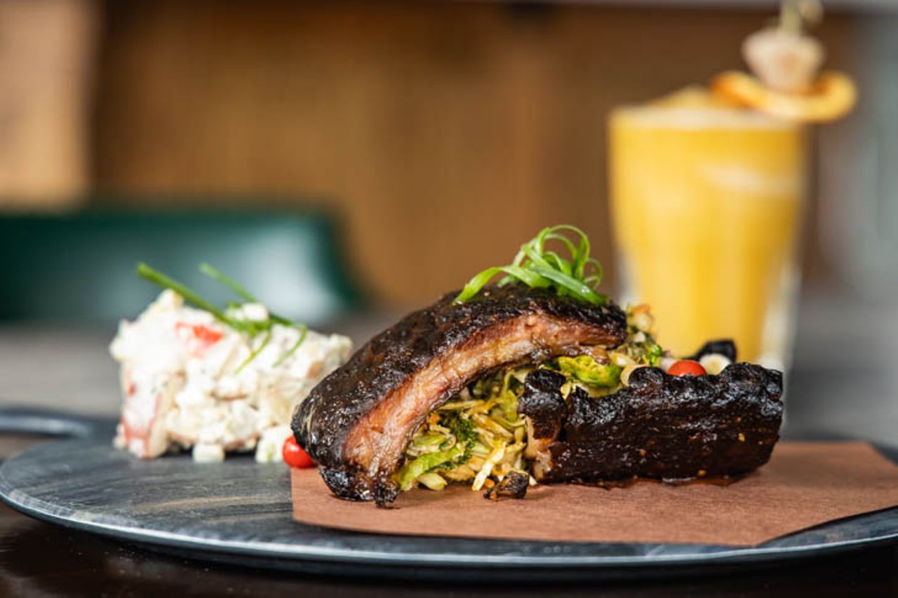 Half rack of baby back ribs: house dry-rubbed, slow-cooked baby back ribs, with mustard and cider and side of smoked picnic potato salad