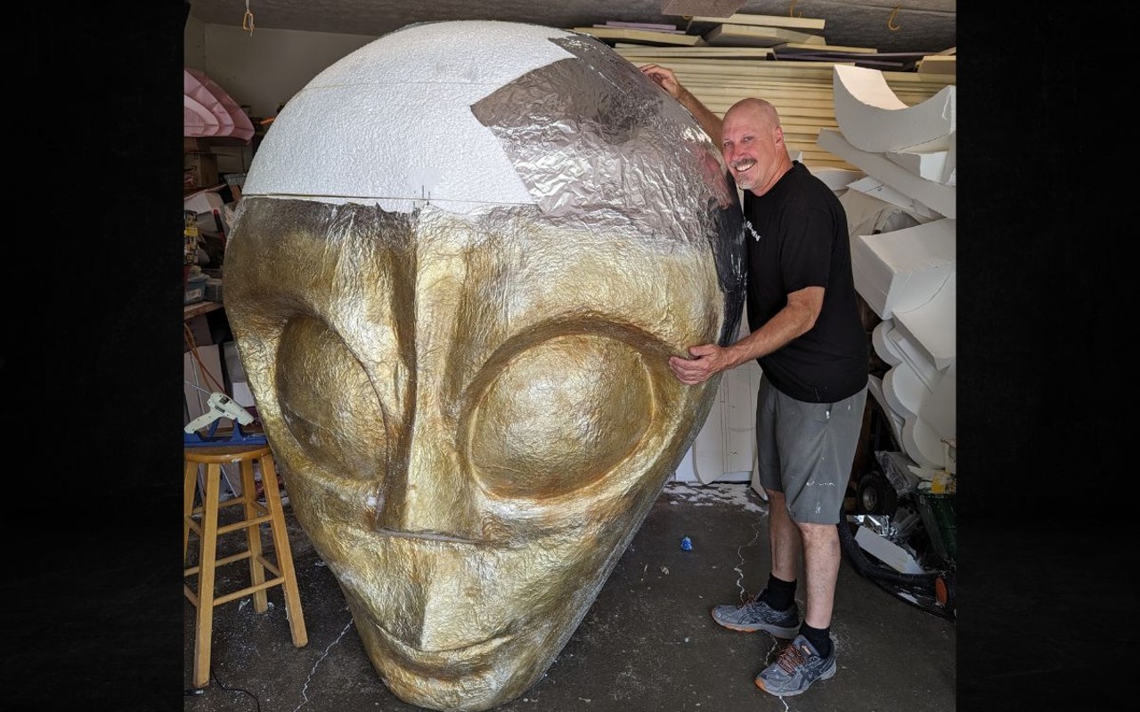 AlloyFX founder and Clive creator Marc Phelps poses with the alien in progress