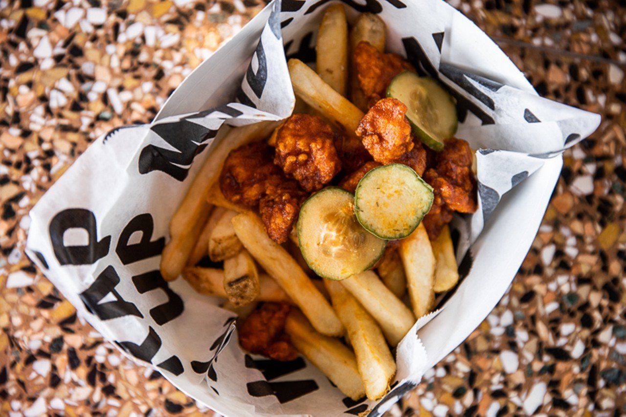 Cincinnati hot fry box with fries, Cincinnati hot chicken tenders and sliced pickles. Located in the Fry Box &#151; Section 112.