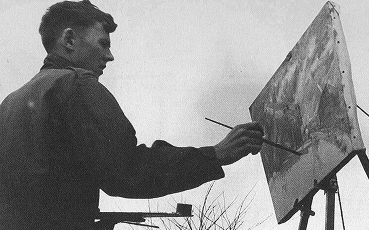 Charley Harper painting outdoors.