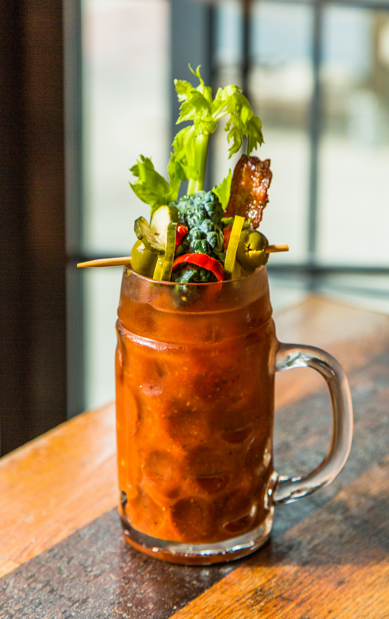 The Eagle // This bloody mary is made with Tito’s vodka, a bit of Guinness stout and housemade mix. The garnish feels pleasantly light in comparison to other big bloodies, with kale, a slice of candied bacon, olives, pickles and peppers. 1342 Vine St., Over-the-Rhine, theeagleotr.com.