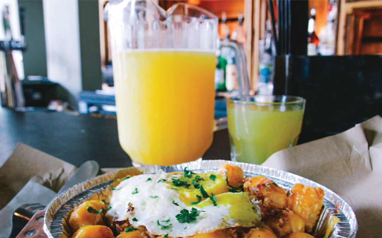 Nation Kitchen & Bar offers a brunch entrée, like breakfast tots, and bottomless mimosas for $25.