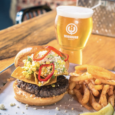 Woodburn Brewing: You Boys Like Mexico?!?!2800 Woodburn Ave., East Walnut HillsThis burger hits hard with a thick patty smothered with corn and avocado salsa, pickled red onions, cotija cheese, Cholula crema and tortilla chips!