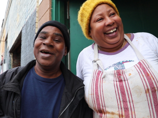 Monica Williams (right) and long-time customer Daryl Owens on Just Cookin's last day