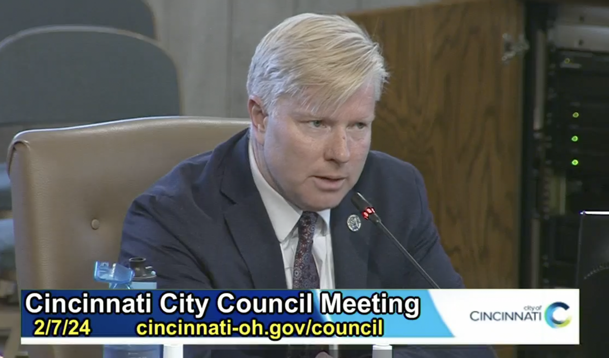 Councilmember Mark Jeffreys reads a joint statement with Reggie Harris and Seth Walsh explaining their position on a Gaza ceasefire resolution during a Feb. 7 Cincinnati City Council meeting.