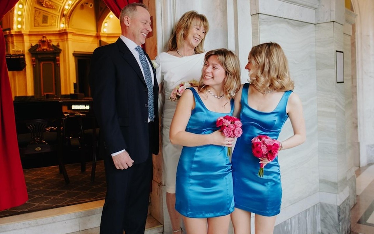 Scott Gaede and Julie Shore with their daughters Rachel and Caroline at their second wedding on Dec. 28.