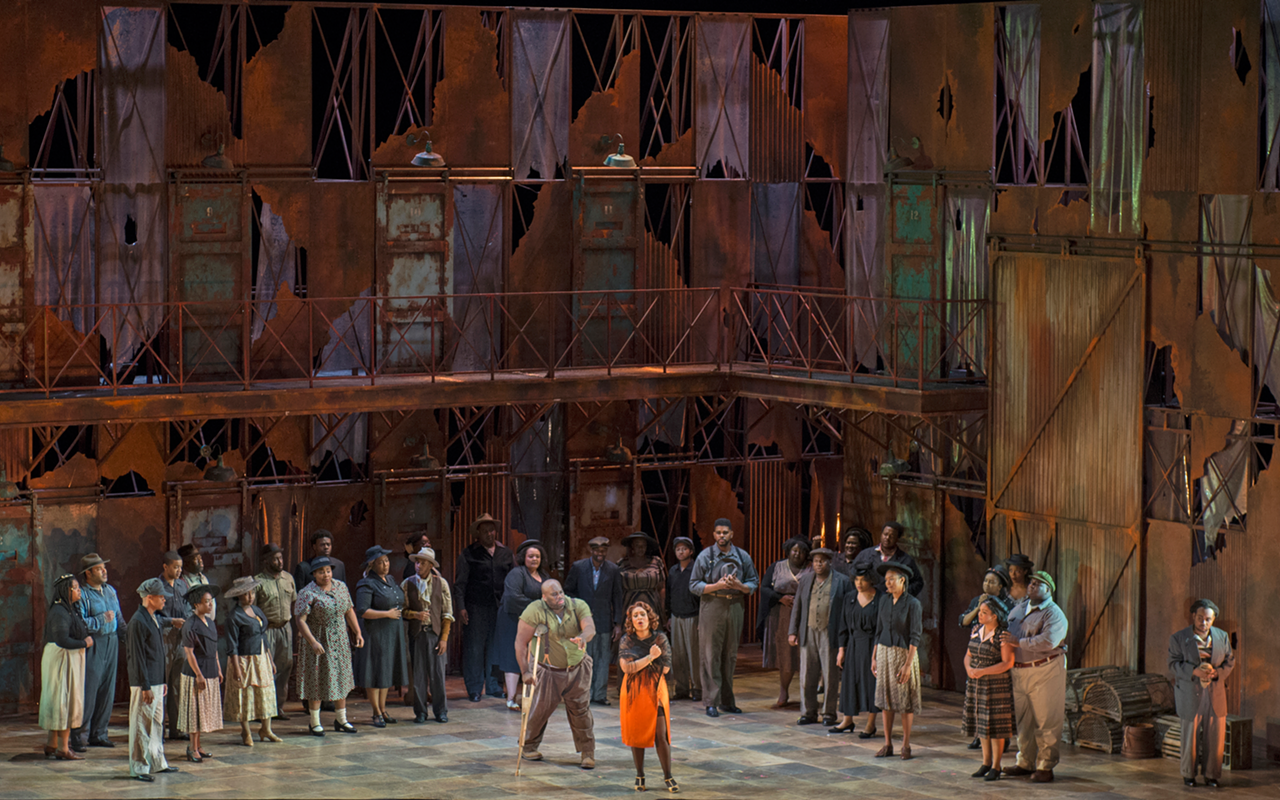 Porgy (Morris Robinson) and Bess (Talise Trevigne) with the Catfish Row community in Cincinnati Opera’s production of the Gershwins’ "Porgy and Bess."