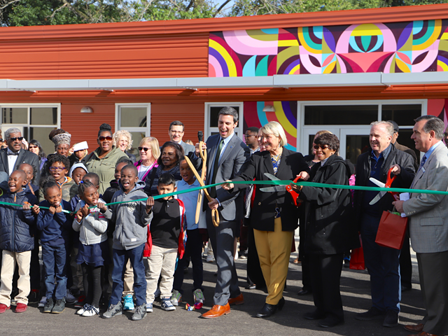 AWL students, Cincinnati City Councilman P.G. Sittenfeld, AWL Principal Jacquelyn Rowedder, Evanston Community Council President Anzora Adkins and others cut the ribbon for the Schiff Wellness Center