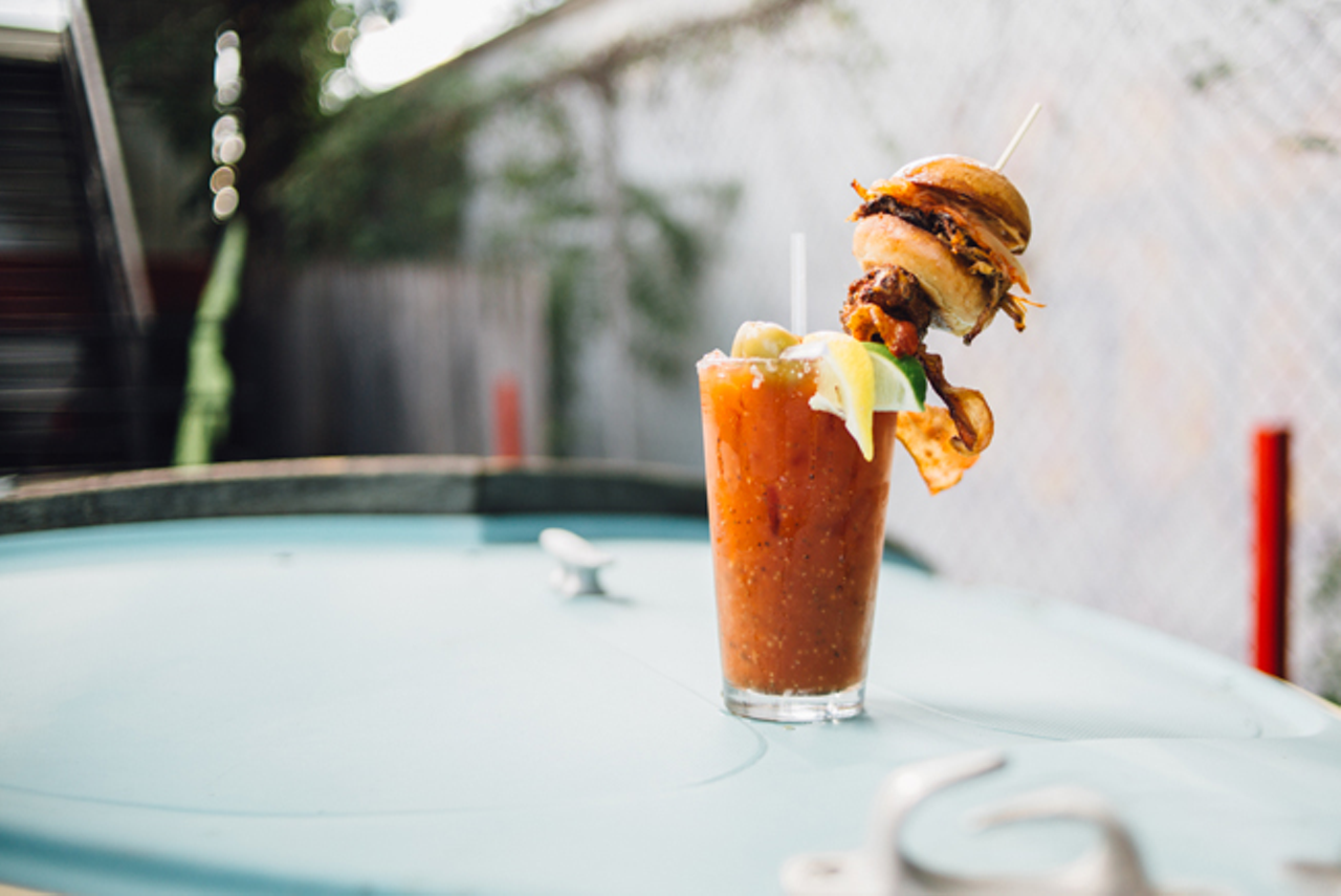 Northside Yacht Club's bloody mary decked out with a smoked wing, slider and bacon