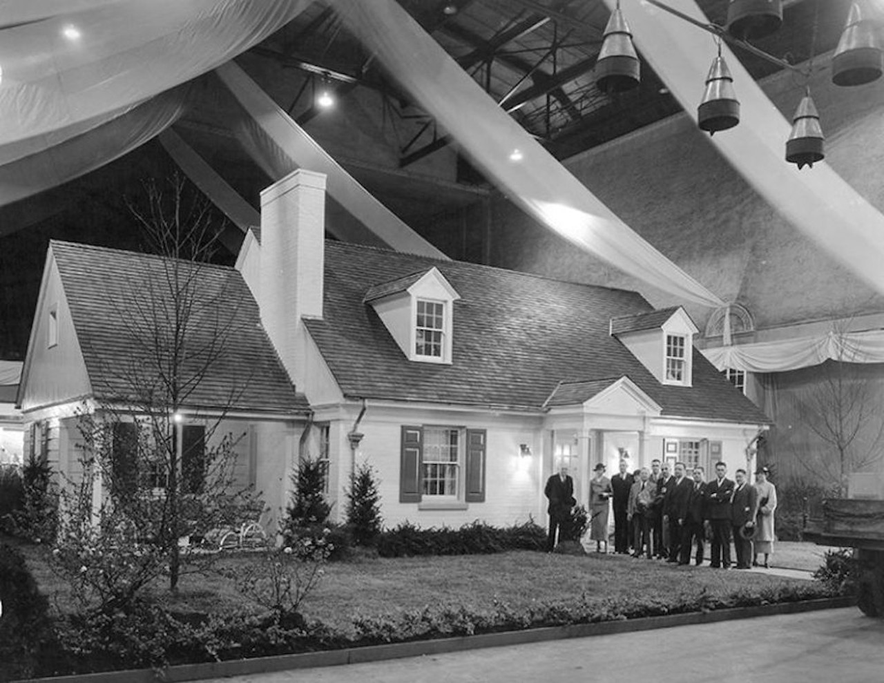 In 1935, the Home Beautiful expo was renamed the "Cincinnati Realtors Home Show and Garden Exposition," and new this year was the chance to see the model home being built. This particular model was later reconstructed at 3824 East Street in Mariemont.