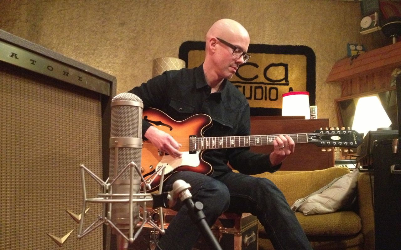 Plastic Ants' Robert Cherry recording guitar overdubs at Ultrasuede during the group's Imperial Phase LP sessions.