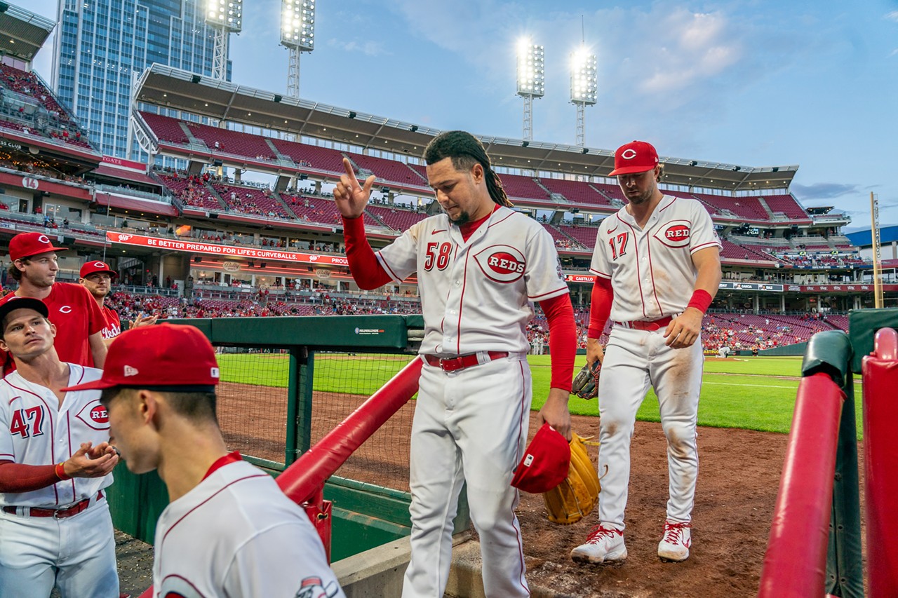 Cincinnati Reds pitcher Luis Castillo (center) returns to the dugout after his final inning of the Cincinnati Reds' game against the Miami Marlins on July 27, 2022. Castillo threw eight strikeouts during the game.