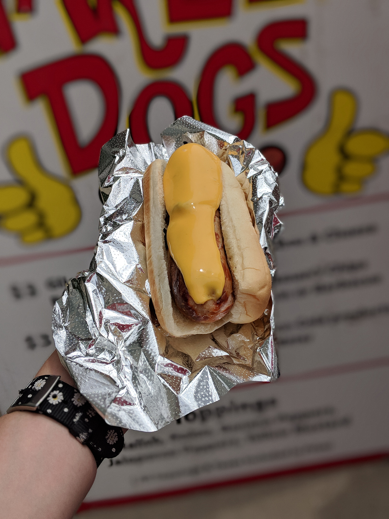 Harley Illes, owner of Harley Dogs, recommends the Glier's bratwurst smothered in nacho cheese.
