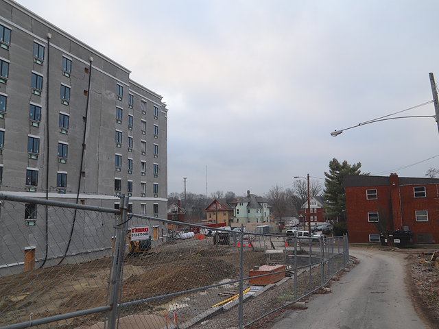 A new hotel under construction next to an apartment building on Burnet Ave. in Mount Auburn. Residents of the apartments were given a 30-day notice to leave at the end of December.