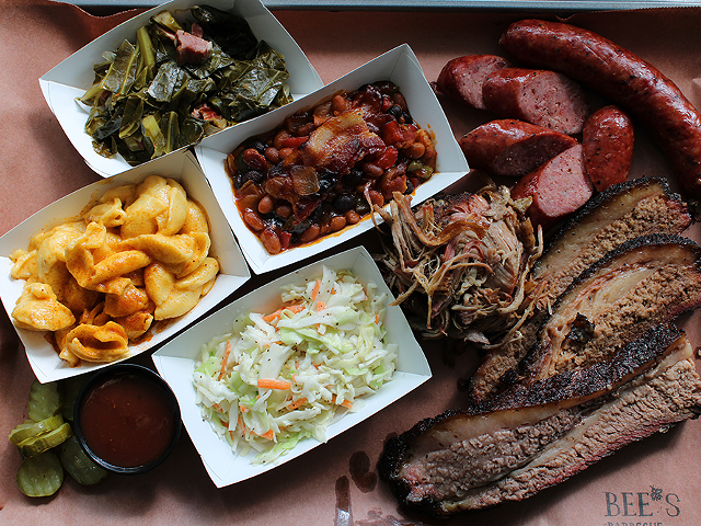 Sides include creamy shells and cheese, collard greens, coleslaw and sticky barbecue beans, which include bits of briskets.