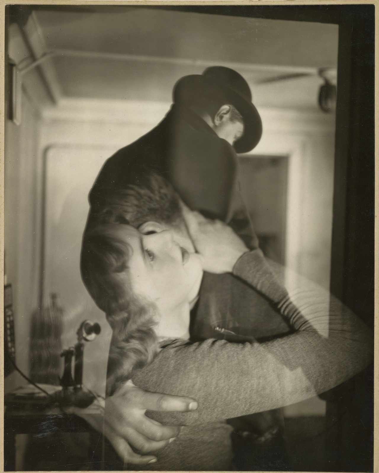 "Couple Embraced ," about 1929 . Gelatin silver print , 9 7/16 × 7 7/16 inches. Courtesy of The J. Paul Getty Museum, Los Angeles