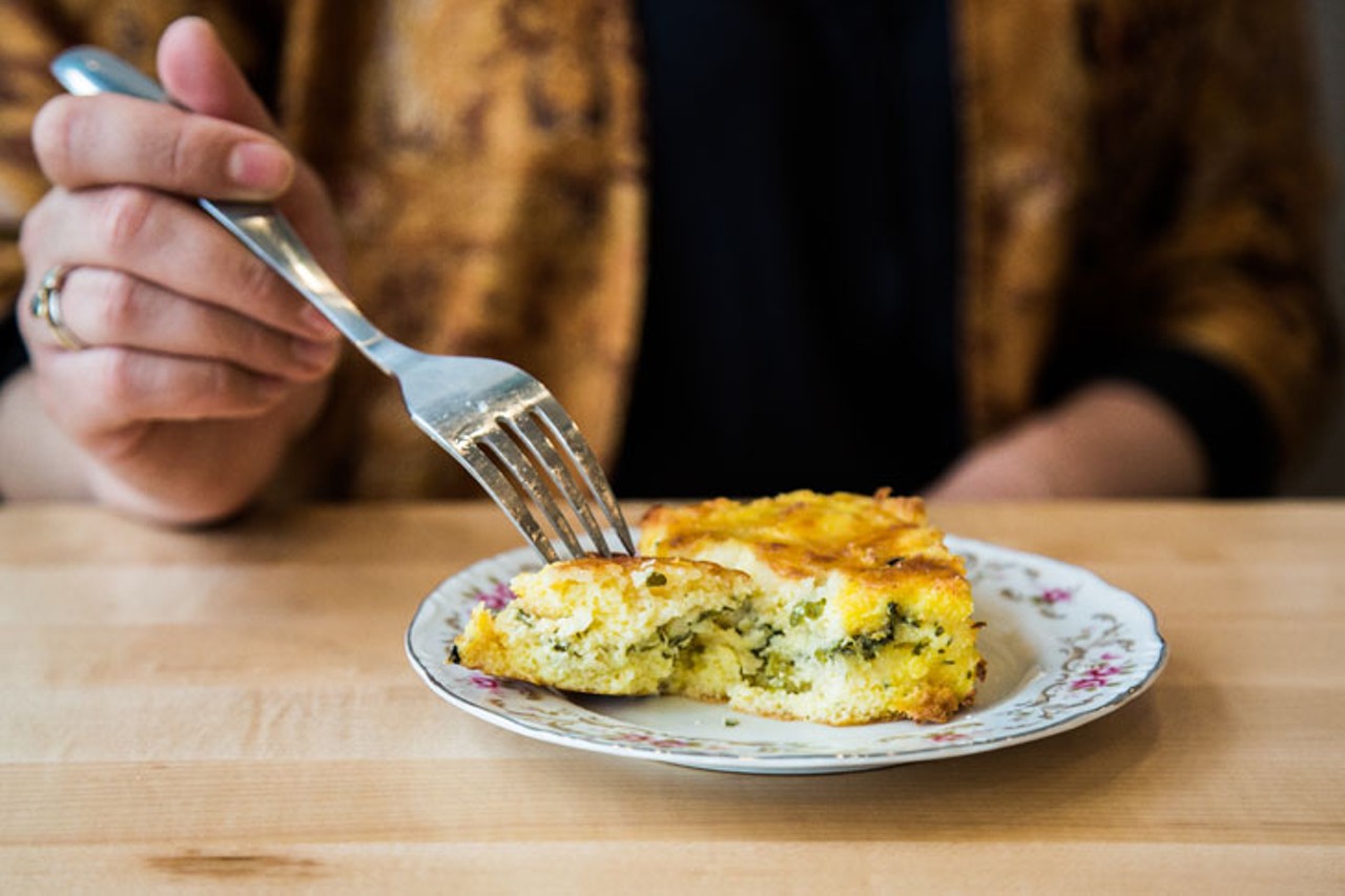 A delicious strata with goat cheese, greens and olive oil bread