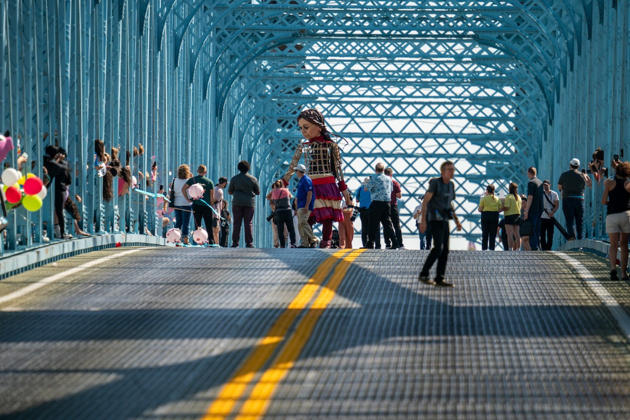 Little Amal begins her walk across the Roebling Bridge on Sept. 22