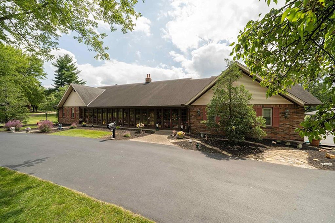 1048 Ohara Lane, Erlanger
$4,500,000 | 5 bd/4.5 ba | 6,706 sq. ft. plus a 22.97-acre lot | Year Built: 1978
"Best kept secret in Erlanger is this Vintage Style Horse Farm Estate right in the heart of it all! Almost 23 acres on this beautiful estate that includes a 5 bed sprawling home with a 55 x 25 Gunite Pool, 3 car garage, 1st floor owner suite, and finished LL w/huge bar & beauty shop, 2 Storage Barns, Detached Country Kitchen/Party Room, 2 Horse Barns with a total of 40 Stalls, and one barn with apartment above it. Guest Cabin w/ 1 bed, full bath, kitchen, loft area, 2 Detached Garages, Tennis Court, Mini Horse Track, 2 Lakes Right next to the upcoming Turfway Race Park. See virtual tour."