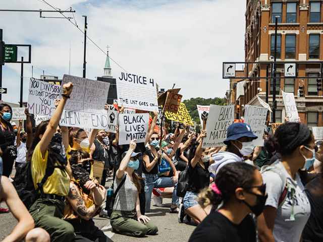 An image from a Cincinnati Black Lives Matter march and rally in June to protest the death of George Floyd and others at the hands of police
