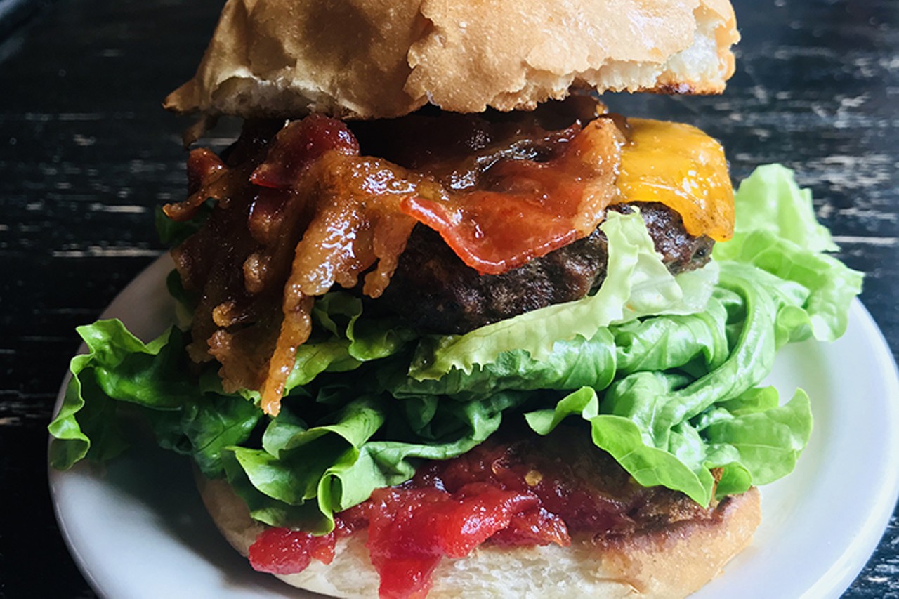 Mecklenburg Gardens
302 East University Ave., Corryville 
The Mecklenburger &#151; served on a white bun and topped with lettuce, candied bacon, tomato jam and cheddar cheese.