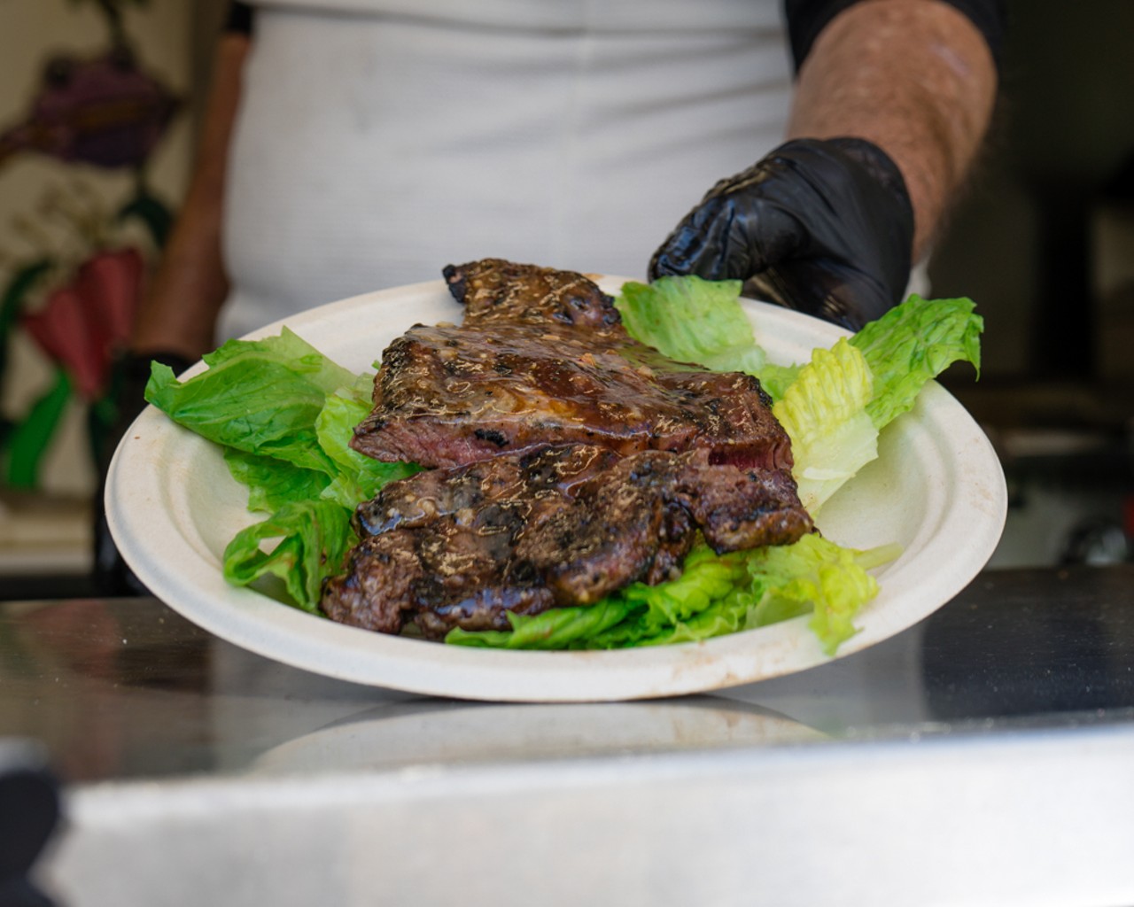 A first time vendor of the event, Wraptor Cafe shows off the ribeye steak used in their burgers.