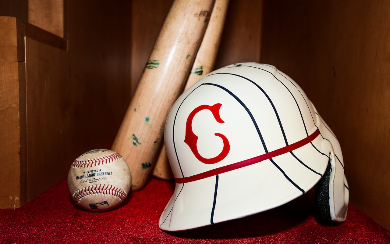 The Cincinnati Reds' batting helmets for the Field of Dreams game on Aug. 11, 2022, boast a thick red band near the bend and a vintage "C" at the middle front.