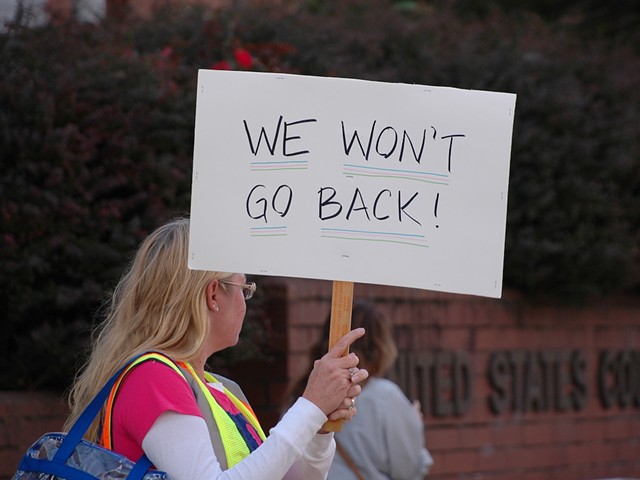 A protester joins a pro-choice rally in Covington on Oct. 8, 2022.
