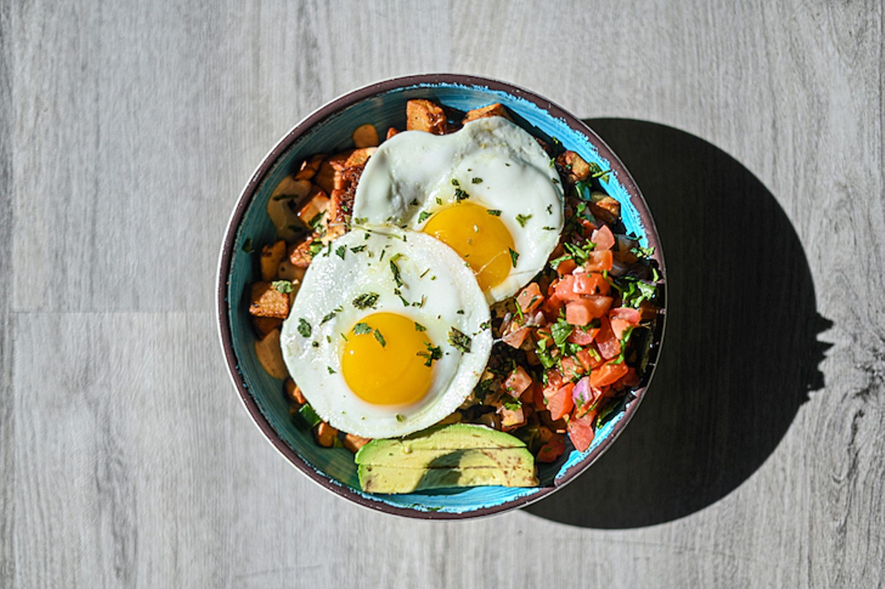 The Hangover: house-made breakfast potatoes, chorizo, avocado, sunny eggs, crema, cilantro, jalape&ntilde;o and house pico
