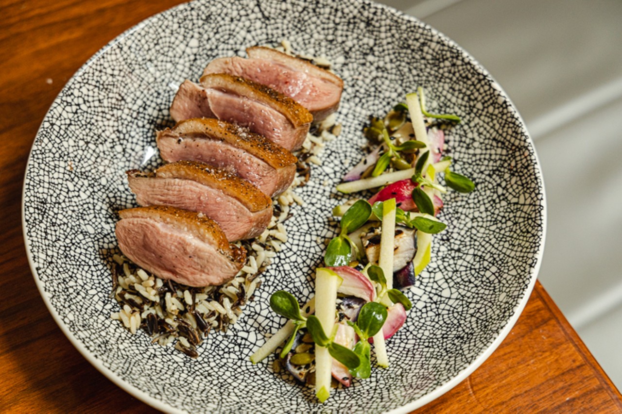 Duck with charred Foxtail Farms radishes, green apple, sprouts and toasted seeds