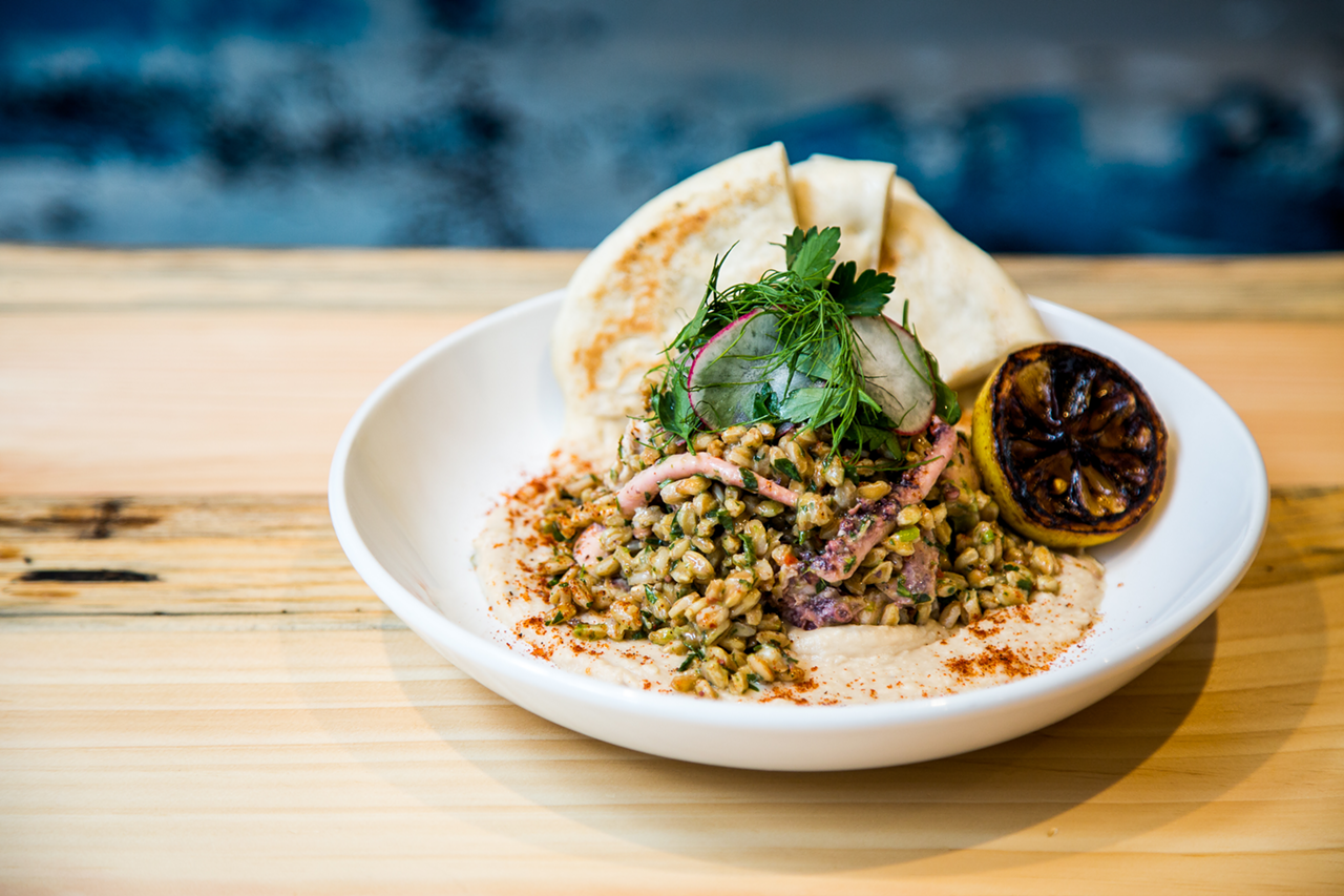 Octopus tabbouleh with duck-fat hummus, farro and merguez spice