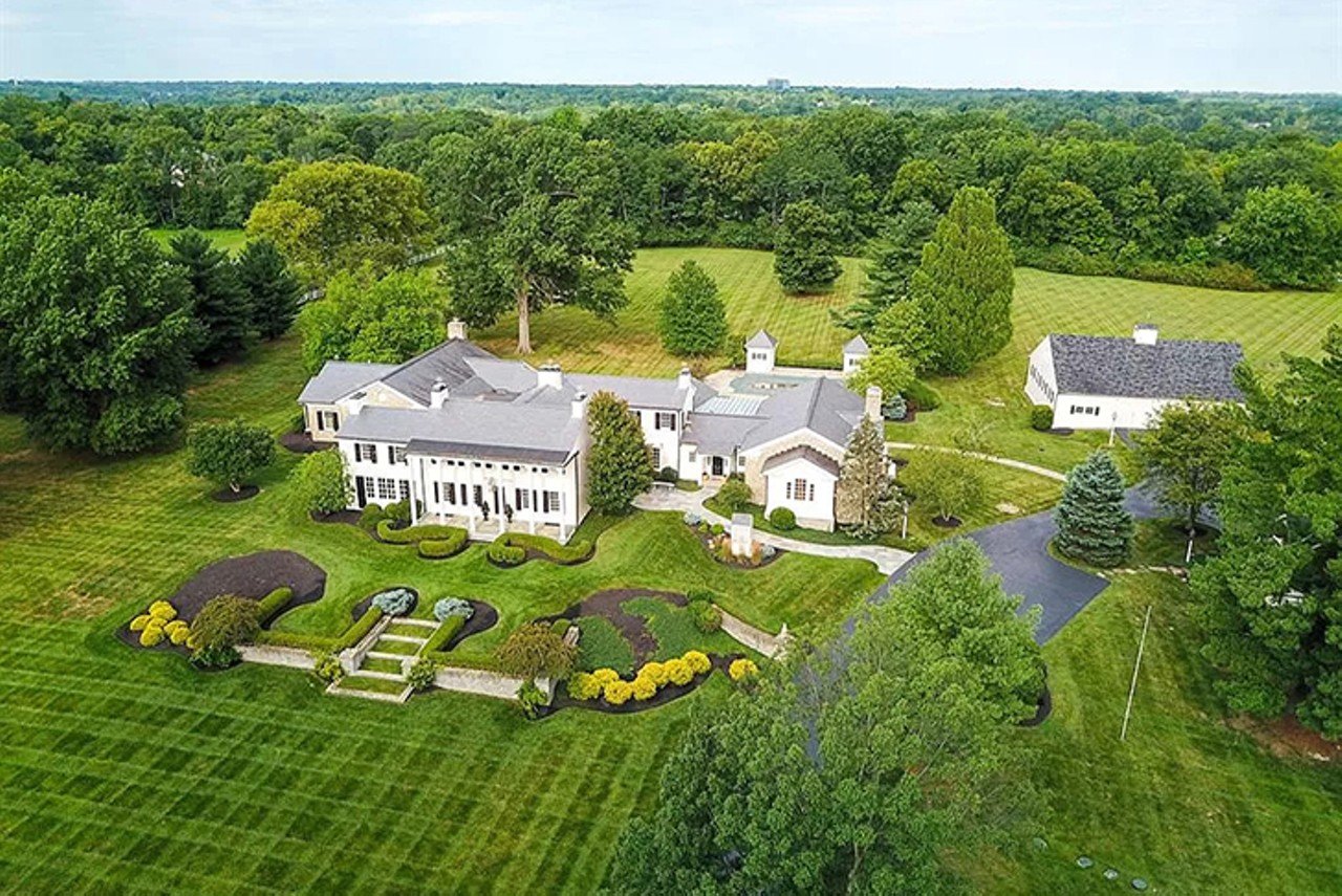8325 Given Road, Indian Hill
$3,695,000 | 5 bd/7 ba | 15,369 sq. ft. | Year Built: 1900
Located on 13 beautiful green acres, this home has classic charm and quality craftsmanship, built in 1900. The estate, which spans over 15,000 square feet, also has a separate carriage house, a great option for guests or a caretaker, as well as an in-ground pool.