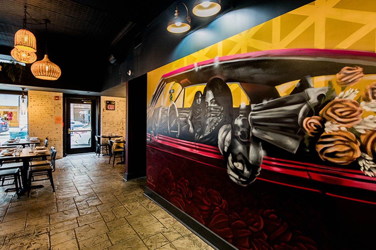 Colorful wall murals enhance the experience