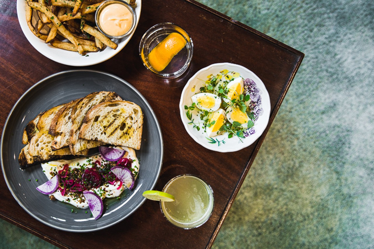 A spread of dishes and craft cocktails available at Karrikin