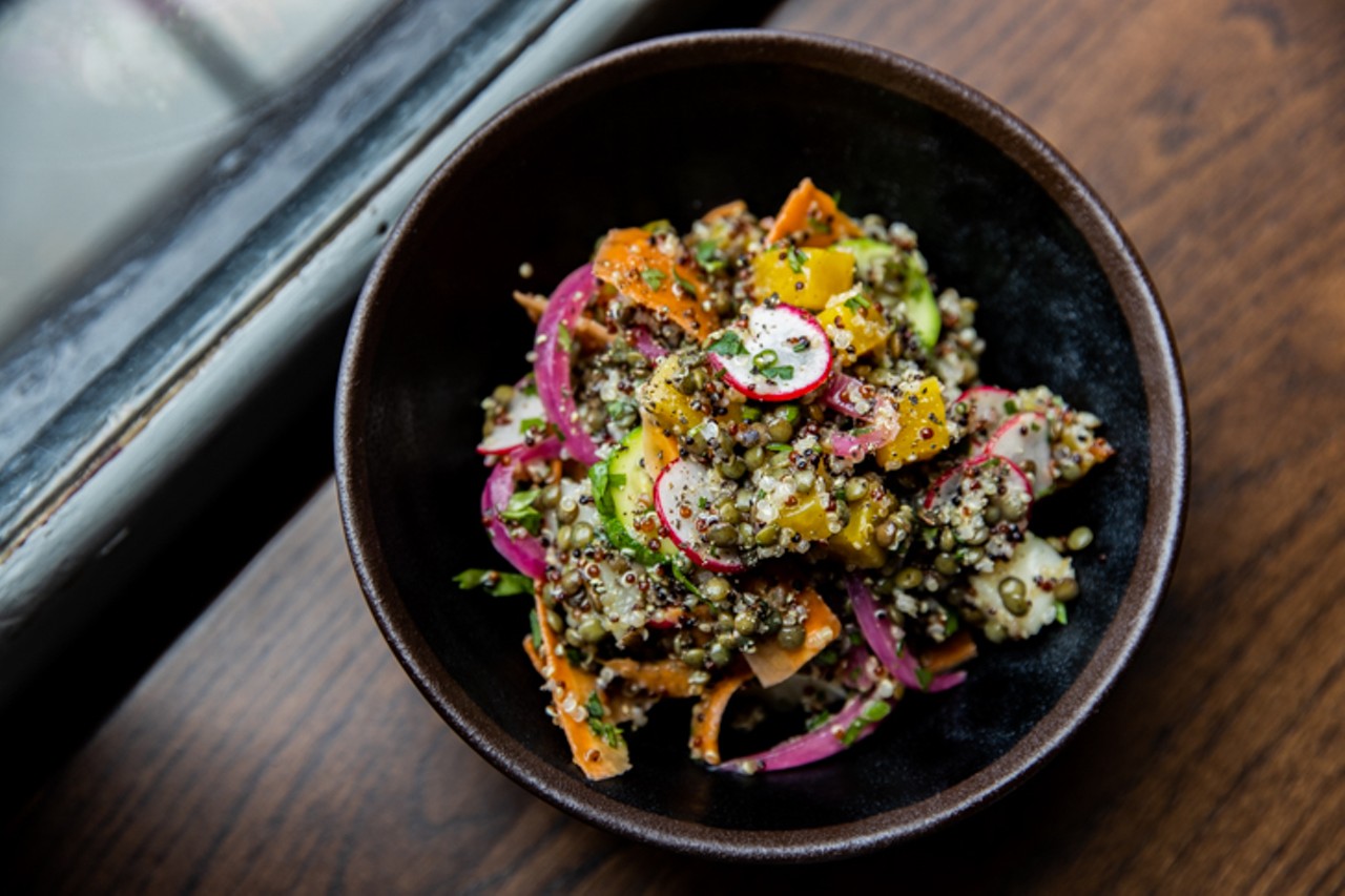 A grain bowl with seasonal vegetables, herbs, pickled onions and house vinaigrette ($9)