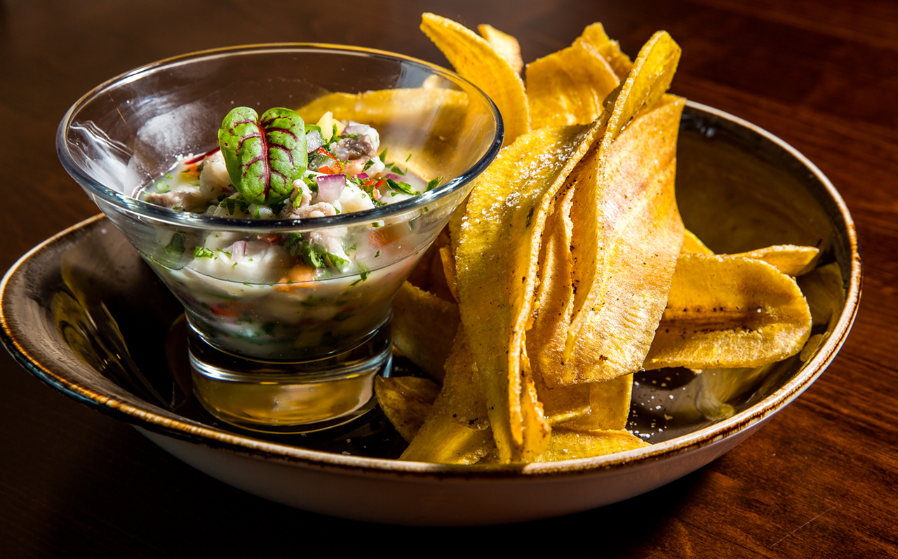 Crisp, bright, tangy, fresh, the ceviche features mahi, snapper and shrimp with diced mango and serrano pepper. It is served with mariquitas, or plantain chips.