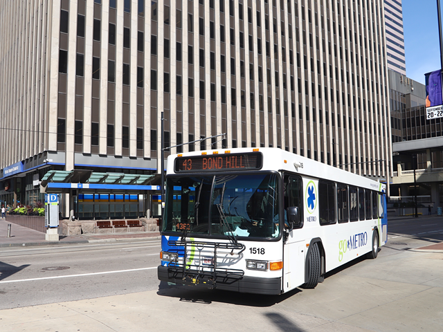 A Route 43 bus pulls into Government Square downtown