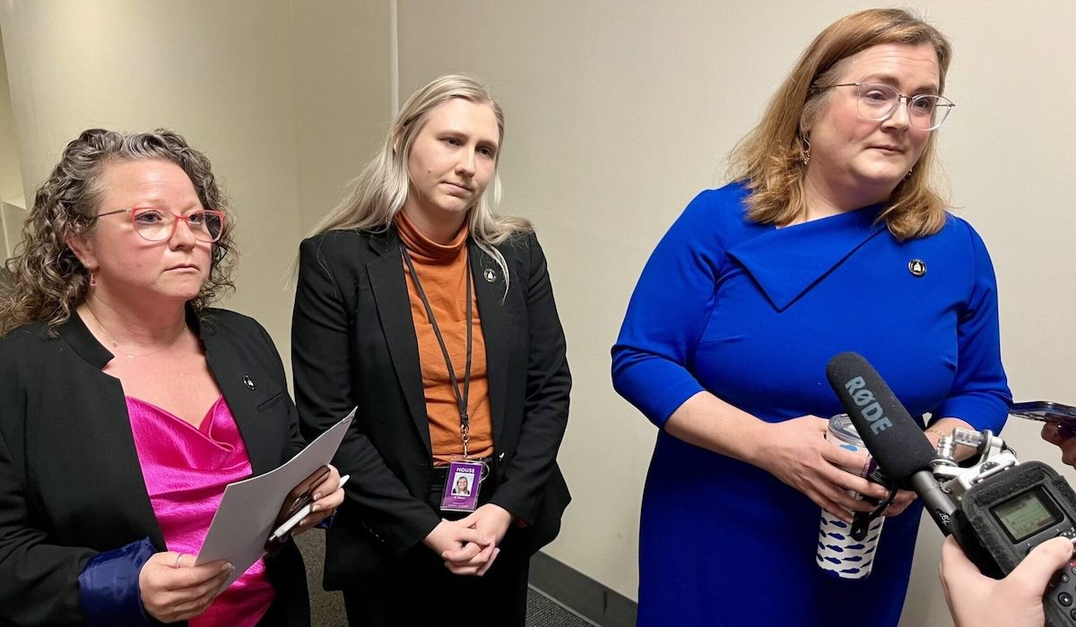 In the middle of the hearing, three Democratic members of the committee walked out of the Annex meeting room in protest of the bill. Reps. Lindsey Burke, right, Rachel Roarx, center, and Adrielle Camuel, left.