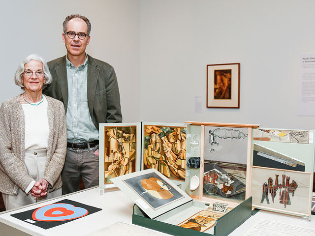 Anne and Jeffrey Harrison at the art museum with their donated Duchamp