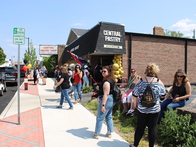 Women stop at Central Pastry bakery during the 2023 Women's Wine and Chocolate Walk in Middletown.